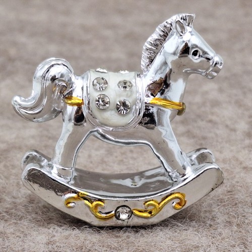 Schaukelpferd silber gold