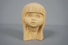 Vintage sculpture of a girl's