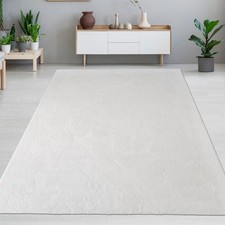 Teppich weiß Hasenfell-Optik elegant weich mit feinem Schimmer modern
