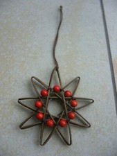 Stern aus Peddigrohr mit Holzperlen orange, Weihnachten