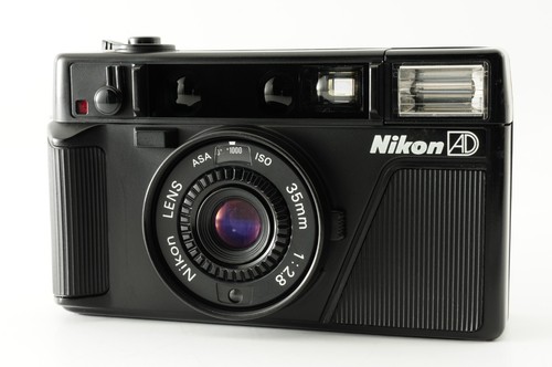 Fast neuwertig nikon l35 - [fast,