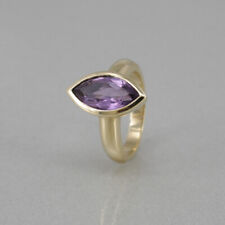 Ring in 585/14k Gelbgold mit Amethyst, Ringweite: 53, ca. 8,2 Gramm