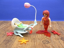 Meerjungfrau mit Baby &