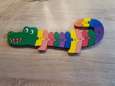 Holzbausteine Krokodil benutzt