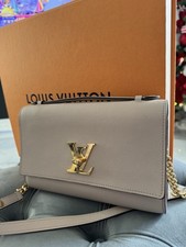 Louis Vuitton Lockme Clutch In