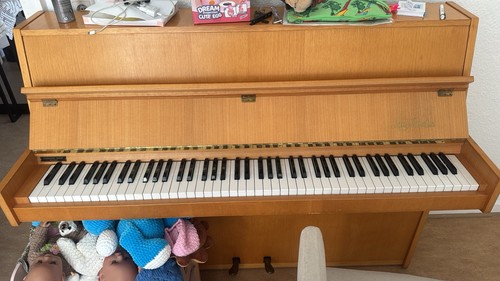 Klavier der marke may - der,
