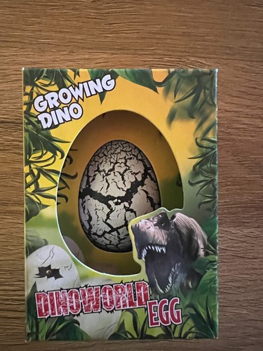 Wachsender dino ei - dino,