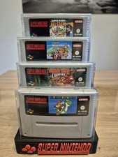 SNES Spielesammlung mit Spielehalter und Schutzhülle