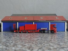 Herpa 1:87 - Volvo FH 04 FD 5-achs Tiefladersattelzug + Presscontainer - Kutter