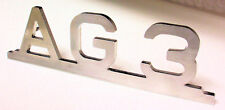 Holder Schriftzug AG3, Knicklenker, Haubenschriftzug 118572