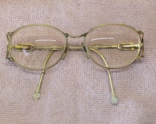 Brille Damen mit  starker Sehstärke gold Bügel sind grünlich gemustert