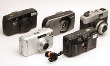 5 defekte Kameras (Nikon 500, Canon Super 28, beroquick, Yashica 110W, AF-10)