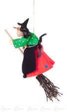 Hexe auf Besen, geschnitzt zum