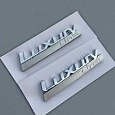 2x Luxury Line Emblem Auto