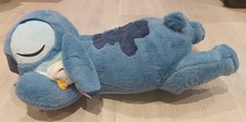 Stitch schlafend mit Ente/