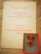 Orden / Abzeichen  Aktivist der Soz. Arbeit   - DDR mit blanko Urkunde