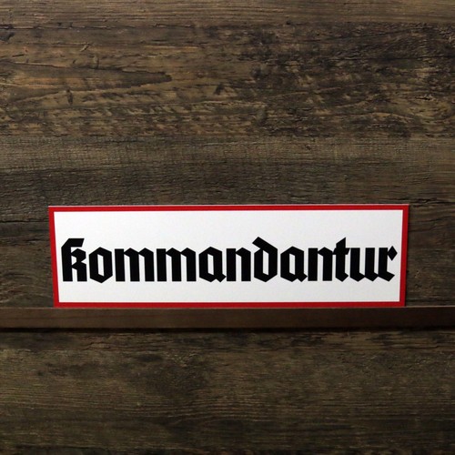 Schild kommandantur wegweiser - schild,