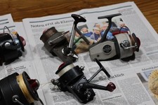 7 Uralte Angelrollen DAM Quick