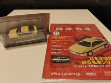 Nissan 100NX B13 1:43 Norev Modellauto gelb Japan JDM SR mit Heft