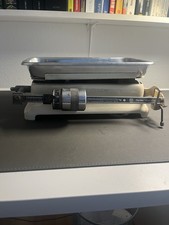 Eine alte französische mechanische Balken-Küchenwaage