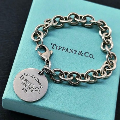 Tiffany return round - to,