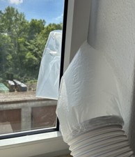 Fenster Schlauchauslass für