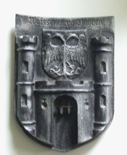 Gusseisernes Wappen der Stadt