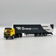 Mercedes-Benz SK mit schwarzem Auflieger "GROUP" European Road Logistics 1/87 H0