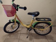 Kinderfahrrad 16 zoll von der Firma Puky in gelb mit einem Korb