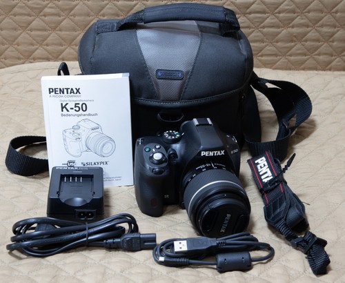 Pentax - k-50, +