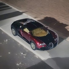 Modellauto Siku 1305 Bugatti 16.4 Veyron rot-schwarz