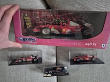4 F1 Modellautos. Ferrarie