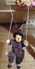 Clown Deko-Figur auf Schaukel