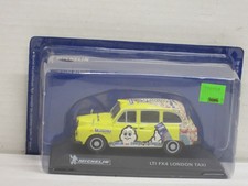LTI FX4 London Taxi "Michelin" in gelb Box IXO/Altaya 1:43