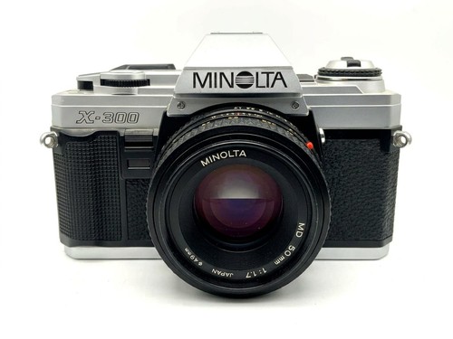 Minolta 300 - +,