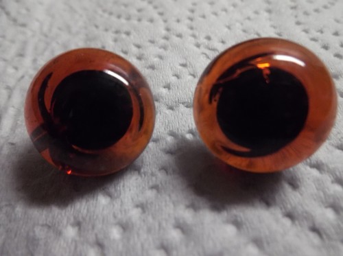 Paar amberfarbene glasaugen - amberfarbene,