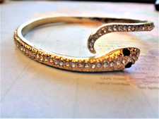 Als Geschenk   Goldfarbener Schlangen - Armreif  19 cm