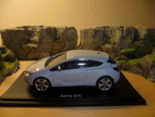 Modellauto Opel Astra - J - GTC,   Maßstab 1:43,  Fahrzeug ist beschädigt !!!