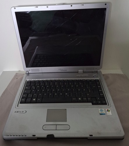 Fujitsu siemens amilo 7300 - fujitsu,