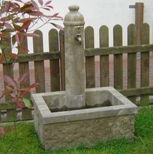 Brunnen aus Naturstein Becken Wandbrunnen