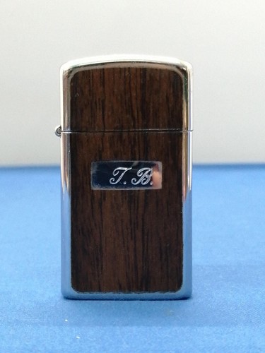 Vintage slim zippo 1980 b - zippo, "t.b"