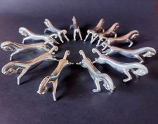 12 alte Messerbänkchen Pferde