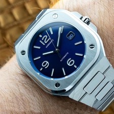 23 - Homage Quarzuhr " Bell &