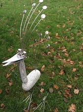 Edelstahl Vogel , Steinvogel