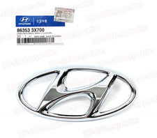GENUINE ® Front Grille Emblem