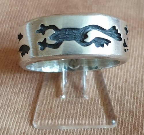 Ring mit symbolisiertem