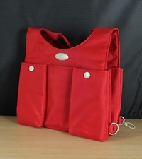 A TUPPERWARE roter Sattel