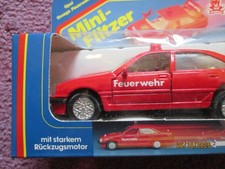 rotes Modellauto Opel Omega