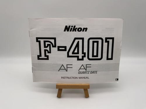 Nikon 401 quartz date - nikon,