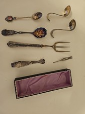 Zucker und Sahnen Löffel